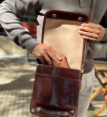 Small Leather Messenger Bag On The Road timeresistance